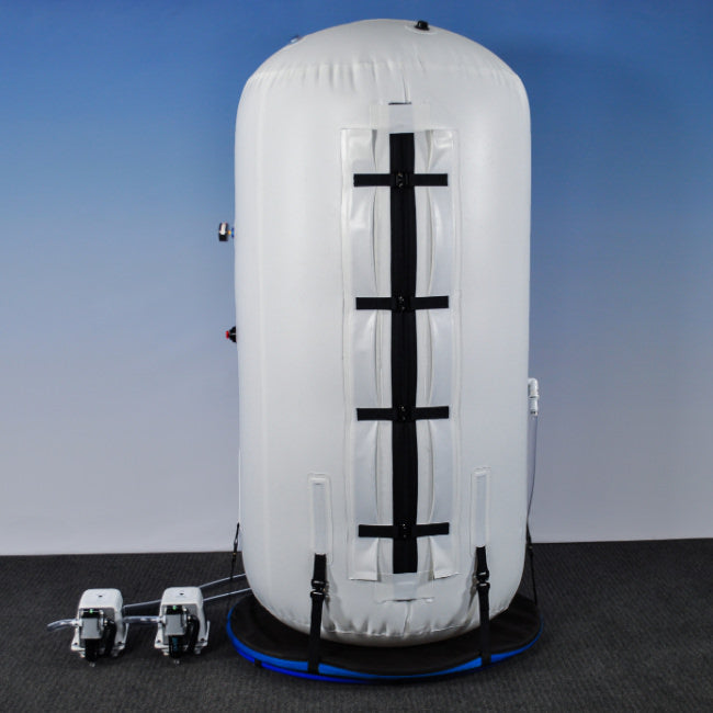 Summit to sea's vertical hyperbaric chamber shown with duel compressors