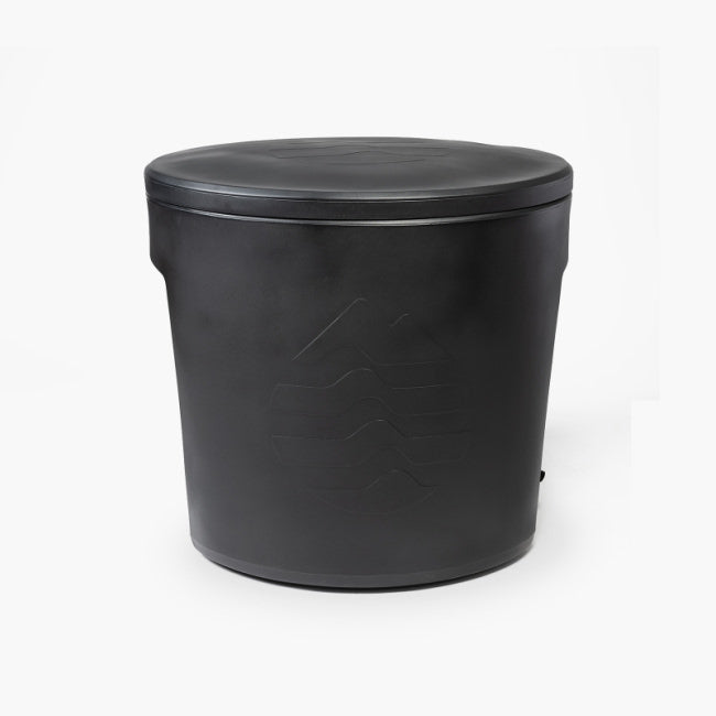 the ice barrel for ice baths sits with its lid on against a white background