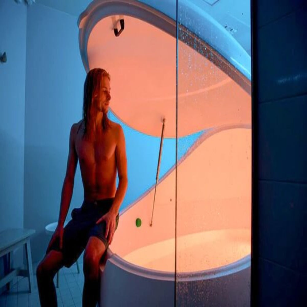 A man sitting On A Dreampod Vmax Float Pod