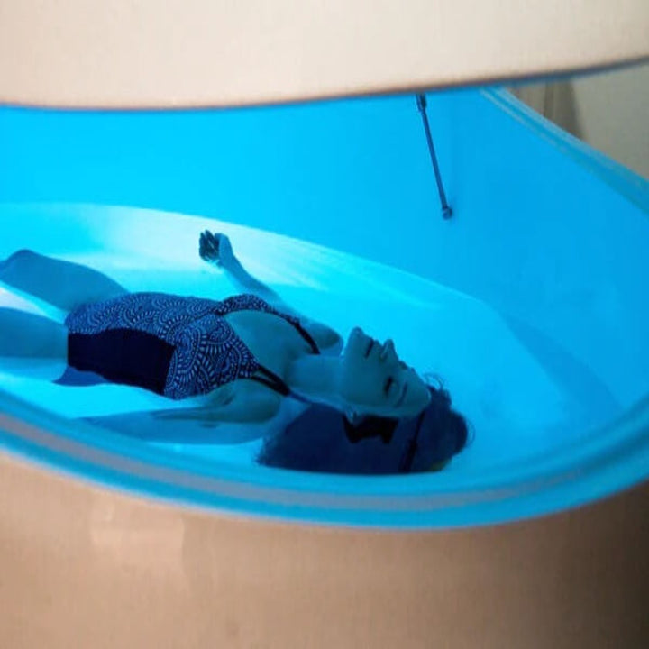 A relaxed lady In Dreampod V2 Float Pod