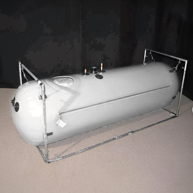 a side view of newtowne's 27" hyperbaric chamber. It sits ready for HBOT with the zipper facing the viewer.
