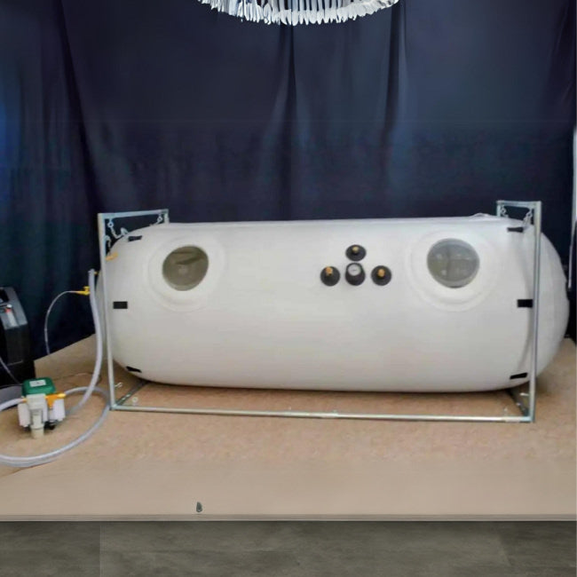 Newtowne's 40" portable hyperbaric chamber sits in a showroom. The two windows and pressure guages for HBOT are clearly visible.