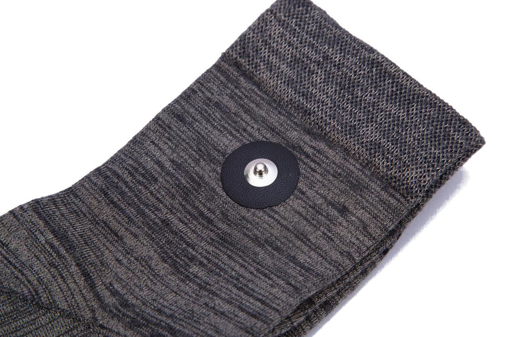 Pair of Hooga grounding socks laid flat with silver fiber knit
