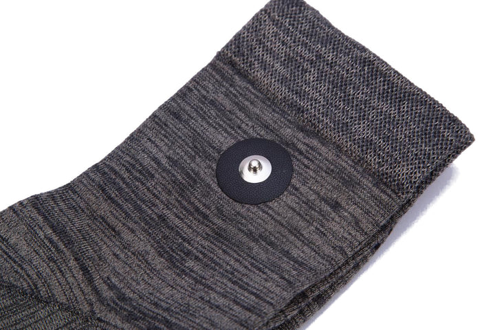 Pair of Hooga grounding socks laid flat with silver fiber knit