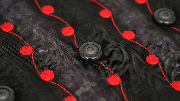 Macro detail of one PEMF coil on the Hooga Red Light PEMF Mat with surrounding LEDs