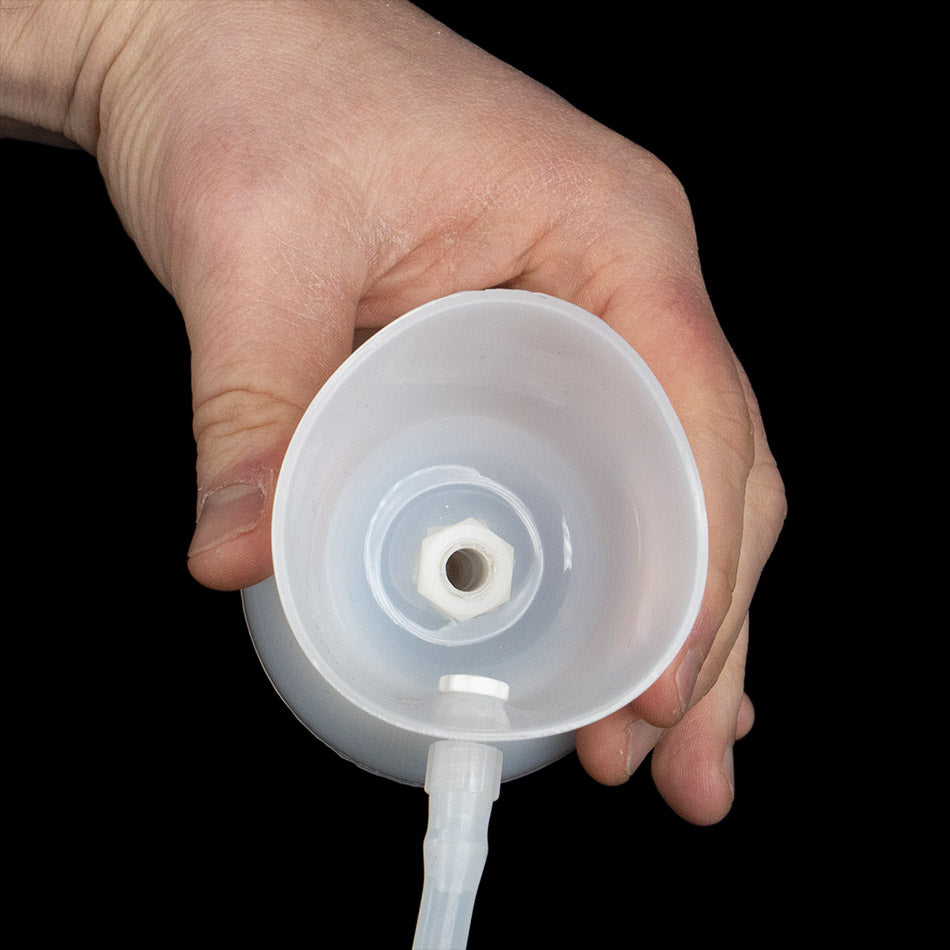 Detail photo of a Promolife flexible silicone ozone cup and its connector